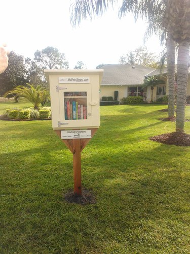 Quote from the woman who submitted it to Little Free Library: "My husband built this library for my parents as a Christmas gift. Their neighbors have been coming to the door of their house for years to borrow books and we thought we'd make it easier on everybody by bringing the books outside! The library was built from scrap wood in our garage and even the screws were recycled from an old canoe my husband built years ago. My 3 children painted dragonflies to decorate the outside making it truly a gift from our whole family to my parents and their neighbors."
