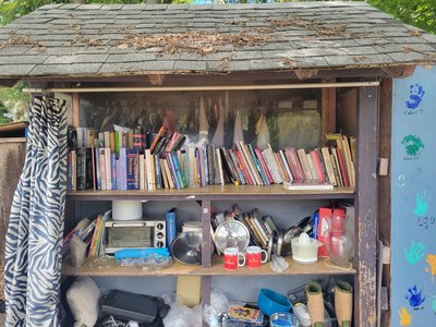 A community sharing station which always has a good selection of books. It is on Algonquin Island in the Toronto islands.